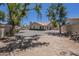 Backyard with gravel and perimeter landscaping at 9412 S Palm Dr, Tempe, AZ 85284