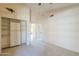 Cozy bedroom featuring ample built-in closet space and easy access to other rooms at 9412 S Palm Dr, Tempe, AZ 85284