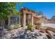 Beautifully landscaped front yard with a covered front entrance at 9412 S Palm Dr, Tempe, AZ 85284