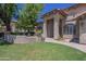 Well-kept front yard with desert landscaping and a quaint front entrance at 9412 S Palm Dr, Tempe, AZ 85284