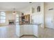 Spacious kitchen with island, fireplace, and built-in entertainment center at 9412 S Palm Dr, Tempe, AZ 85284