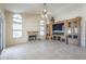 Bright living room with a fireplace, large media center, and lots of natural light at 9412 S Palm Dr, Tempe, AZ 85284