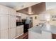 Spacious kitchen boasts abundant storage and modern appliances at 1133 N 84Th Pl, Scottsdale, AZ 85257