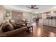 Inviting living room featuring hardwood floors and comfortable seating arrangement at 1133 N 84Th Pl, Scottsdale, AZ 85257
