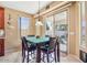 Cozy dining area features a sliding glass door providing access to the backyard at 1145 E Winchester Pl, Chandler, AZ 85286