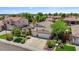 Charming home exterior featuring a well-manicured lawn, mature trees, and an inviting facade at 1145 E Winchester Pl, Chandler, AZ 85286