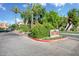 Entrance to Parkview Villas community with lush landscaping and signage at 1211 N Miller Rd # 257, Scottsdale, AZ 85257