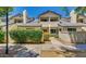 Townhome with neutral-toned exterior, tiled roof, and a pathway to the front door at 1222 W Baseline Rd # 163, Tempe, AZ 85283