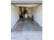 Uncluttered garage space with concrete floor, storage on back wall, and white interior paint at 1222 W Baseline Rd # 163, Tempe, AZ 85283