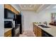 Kitchen with stone countertops, stainless steel appliances and ample cabinet space at 1222 W Baseline Rd # 163, Tempe, AZ 85283