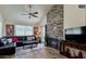 Inviting living room with vaulted ceilings and a striking brick fireplace feature wall at 1222 W Baseline Rd # 163, Tempe, AZ 85283