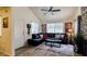 Comfortable living room with vaulted ceilings, modern ceiling fan and inviting decor at 1222 W Baseline Rd # 163, Tempe, AZ 85283