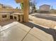 Back patio with stone counter, ideal for grilling and outdoor dining at 13106 W Calavar Rd, Surprise, AZ 85379