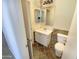 Bathroom with a vanity, mirror, light fixture, toilet and tiled floor at 13106 W Calavar Rd, Surprise, AZ 85379