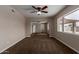 Bedroom featuring a ceiling fan and large window at 137 W Wagoner Rd, Phoenix, AZ 85023