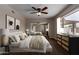 Staged bedroom with a large window for natural light and closet with mirrored doors at 137 W Wagoner Rd, Phoenix, AZ 85023