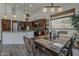 Dining area with overhead lighting, granite counter-tops and cabinetry at 1441 E Folley Pl, Chandler, AZ 85225
