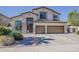 Inviting two-story home with a three car garage and meticulously maintained landscaping at 1441 E Folley Pl, Chandler, AZ 85225