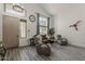 Bright living room featuring vaulted ceilings and new flooring, perfect for entertaining at 1441 E Folley Pl, Chandler, AZ 85225