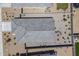Aerial view of a single Gathering house with a backyard, desert landscaping and a tile roof at 1560 E Squire Dr, Casa Grande, AZ 85122
