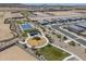 Aerial perspective displays neighborhood playground and basketball court, integrated with walking trails at 1560 E Squire Dr, Casa Grande, AZ 85122