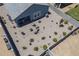 Overhead view of a low maintenance backyard, showcasing a patio area, gravel landscape, and secure fencing at 1560 E Squire Dr, Casa Grande, AZ 85122