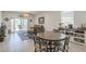 Cozy dining area blends seamlessly with the living room and features a sliding glass door to the outdoor patio at 1560 E Squire Dr, Casa Grande, AZ 85122