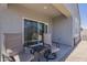 Relaxing covered patio, perfect for outdoor seating, features a sliding glass door at 1560 E Squire Dr, Casa Grande, AZ 85122