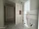 En suite bathroom with plumbing fixtures in new construction home at 16178 W Bajada Rd, Surprise, AZ 85387