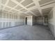 Spacious garage with ample room for parking and storage at 16178 W Bajada Rd, Surprise, AZ 85387
