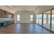 Bright living space with an extended bar area and sliding doors to a covered patio area at 16777 W Sheila Ln, Goodyear, AZ 85395