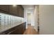 Pantry features custom cabinets, a countertop, and easy access to the kitchen for convenience at 16777 W Sheila Ln, Goodyear, AZ 85395