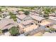 Aerial view of a private backyard with a covered patio, perfect for outdoor relaxation and entertainment at 16917 W Sonora St, Goodyear, AZ 85338