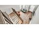 Open-concept living room showcasing wood-look floors, neutral paint, high ceilings, staircase and stylish decor at 16917 W Sonora St, Goodyear, AZ 85338