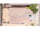 Close aerial view of the rooftop of a residence, showing tiling, vents, and satellite dishes at 16917 W Sonora St, Goodyear, AZ 85338