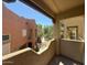 Community balcony overlooking meticulously maintained landscaping and well-kept desert community buildings at 1718 W Colter St # 142, Phoenix, AZ 85015