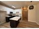 Open-concept kitchen featuring an island, modern appliances, and an adjacent dining area at 1718 W Colter St # 142, Phoenix, AZ 85015