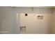 Laundry room featuring washer and dryer hookups, electrical outlets, and neutral paint at 1718 W Colter St # 142, Phoenix, AZ 85015