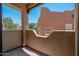 View from the balcony, showcasing outdoor living with partial views of desert landscaping at 1718 W Colter St # 142, Phoenix, AZ 85015