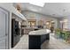 Stylish kitchen with granite countertops, a large island, and modern appliances, perfect for cooking and entertaining at 18066 W Weatherby Dr, Surprise, AZ 85374
