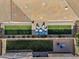 Birds eye view of a landscaped backyard featuring a covered patio, seating area, and turf grass at 19428 S 210Th Pl, Queen Creek, AZ 85142