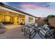 Outdoor seating area with stylish chairs around a fire pit, perfect for evening gatherings at 19428 S 210Th Pl, Queen Creek, AZ 85142