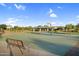 Community basketball court with benches, nearby playground, and picnic tables under a gazebo at 19428 S 210Th Pl, Queen Creek, AZ 85142