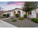 Charming single-story home at dusk with desert landscaping at 19428 S 210Th Pl, Queen Creek, AZ 85142