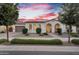 Charming single-story home with landscaped front yard and attached two-car garage, perfect for suburban living at 19428 S 210Th Pl, Queen Creek, AZ 85142