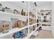Walk-in pantry with ample shelving providing plenty of storage space at 19428 S 210Th Pl, Queen Creek, AZ 85142