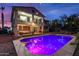Beautiful backyard showcasing the pool, patio, balcony, and outdoor living spaces at 20139 N Bustos Way, Maricopa, AZ 85138