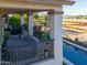 Upstairs balcony featuring outdoor spa, seating area and a view of the pool at 20139 N Bustos Way, Maricopa, AZ 85138