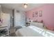 Bright bedroom with playful decor, a cozy bed, and coordinated furnishings at 20139 N Bustos Way, Maricopa, AZ 85138