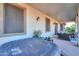 Covered patio featuring a hot tub, outdoor furniture, and access to the home at 20139 N Bustos Way, Maricopa, AZ 85138